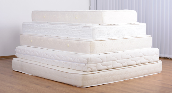 several mattresses stacked on top of each other